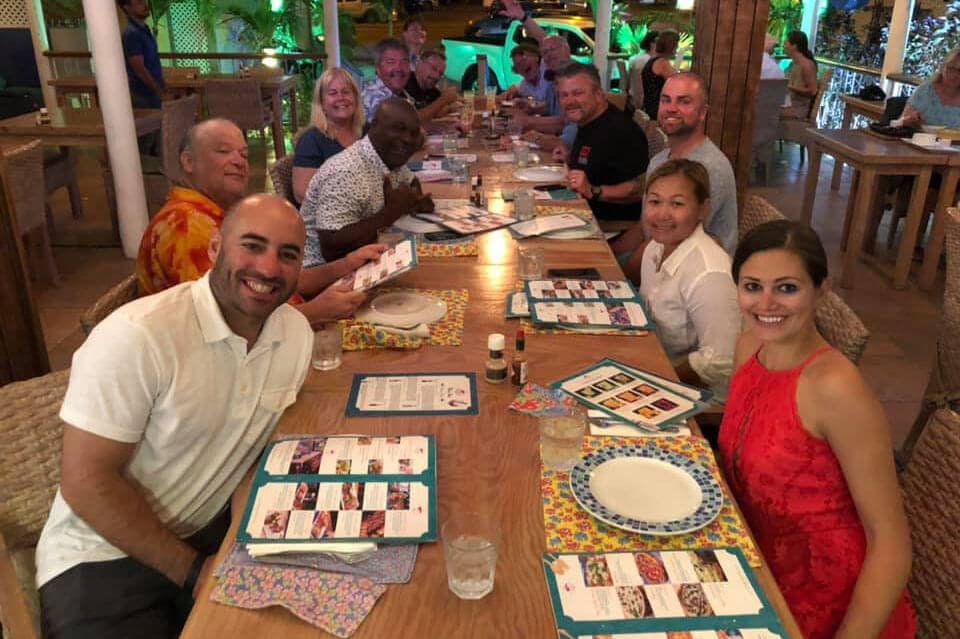 Travelers enjoying a fantastic dinner with SXT Adventures